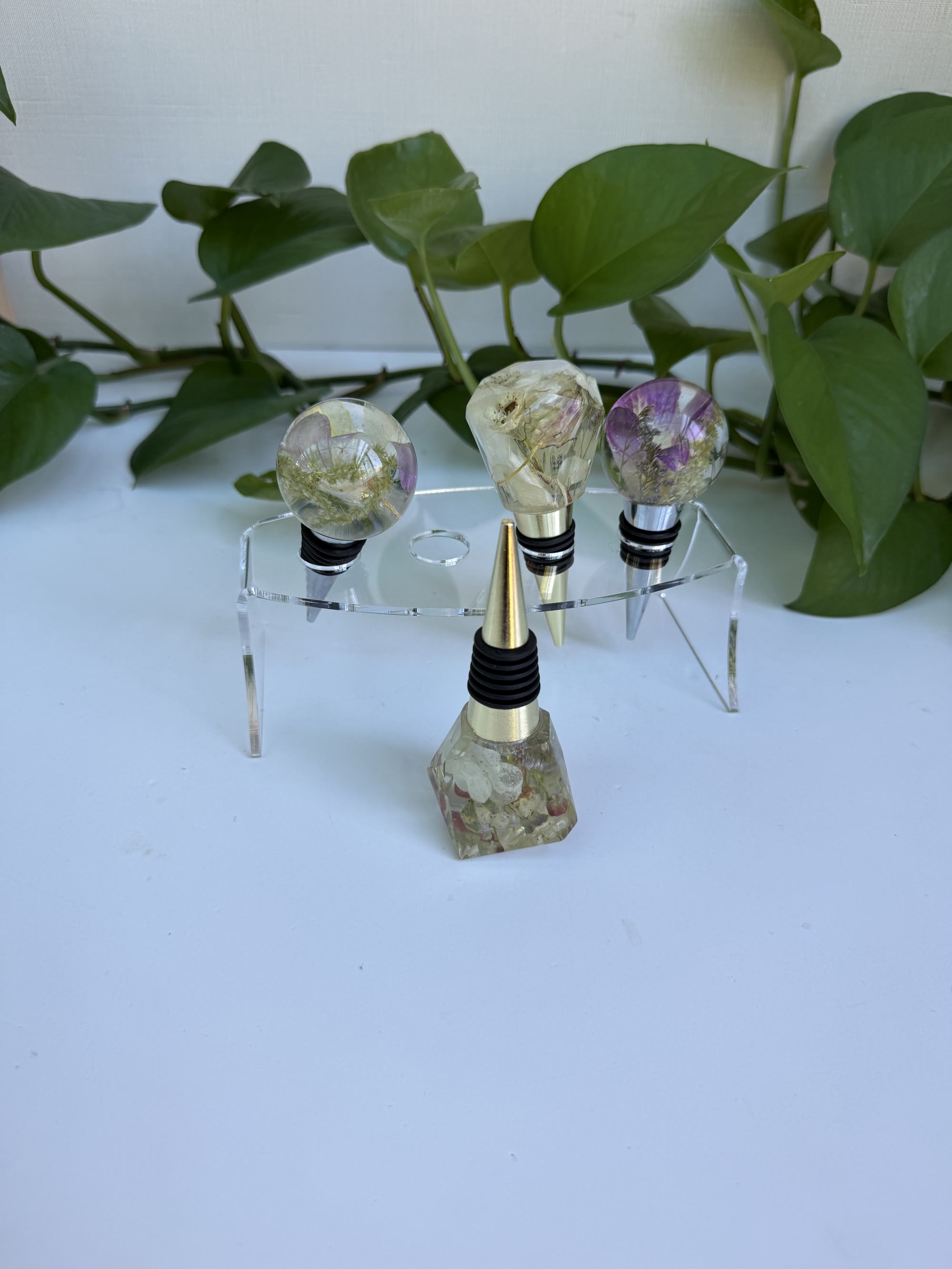 Wine stoppers made from preserved wedding flowers