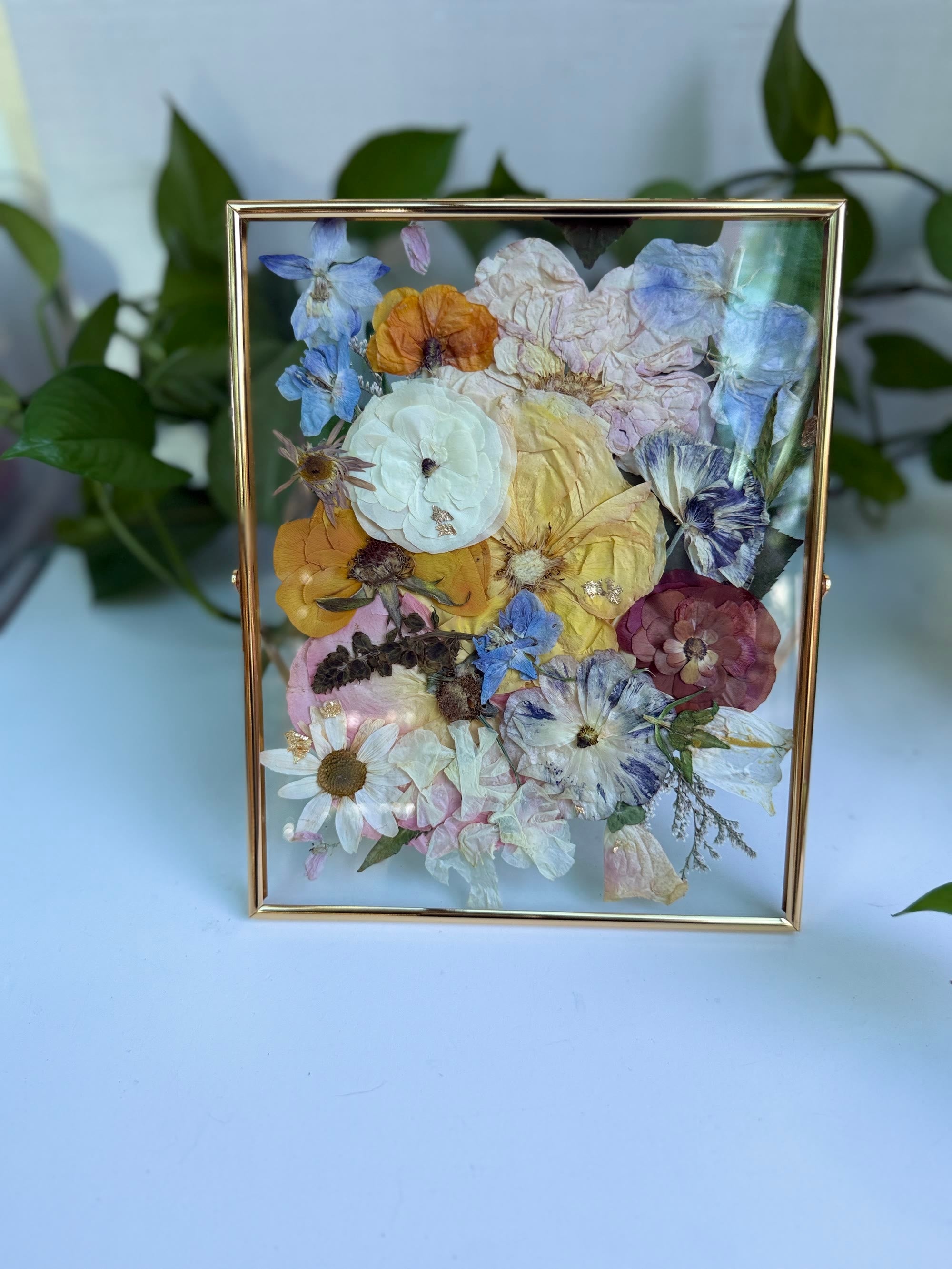 Wedding flowers preserved in a finished frame