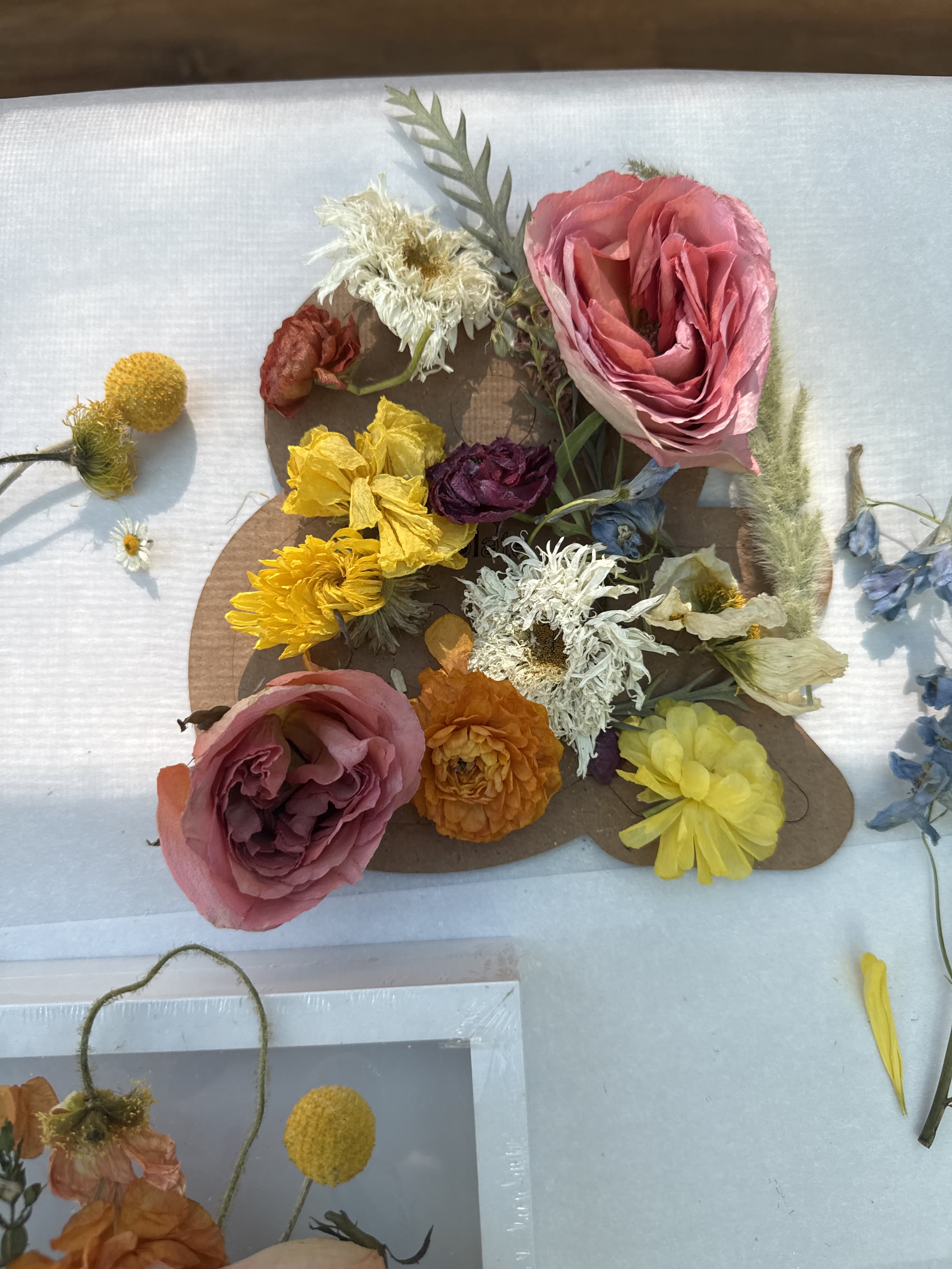 AK arranging preserved wedding flowers