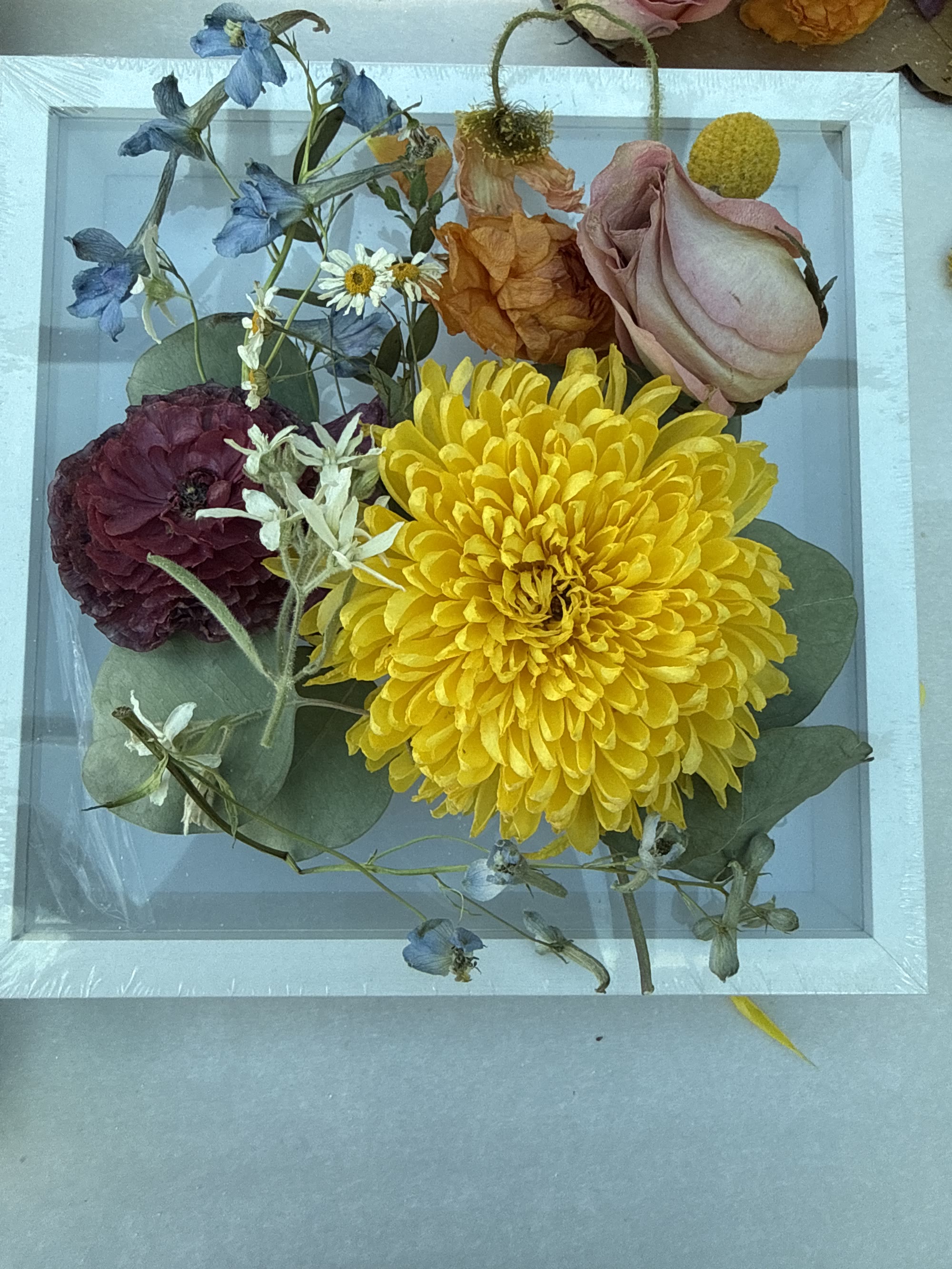 Pressed wedding flower artwork in progress